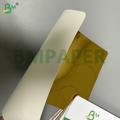 ورق مقوى معدني 200 جرام 250 جرام ذهبي وجه واحد مع ظهر أبيض 70 × 100 سم